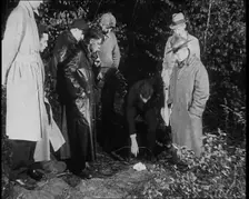 American Police Officers Searching the Area Outside American Aviator Charles Augustus..., 1930s. Creator: British Pathe Ltd
