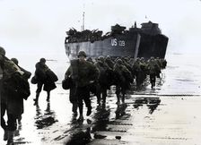 American troops disembark onto the sands of Normandy, 1944