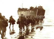 American troops disembark onto the sands of Normandy, 1944. Creator: Unknown