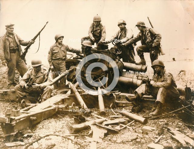 American troops looking for souvenir near Cherbourg airport, July 1944. Artist: Unknown