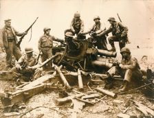 American troops looking for souvenir near Cherbourg airport, July 1944