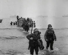 American Troops Walking Onto a North African Beach as Part of Operation Torch 1942. Creator: British Pathe Ltd