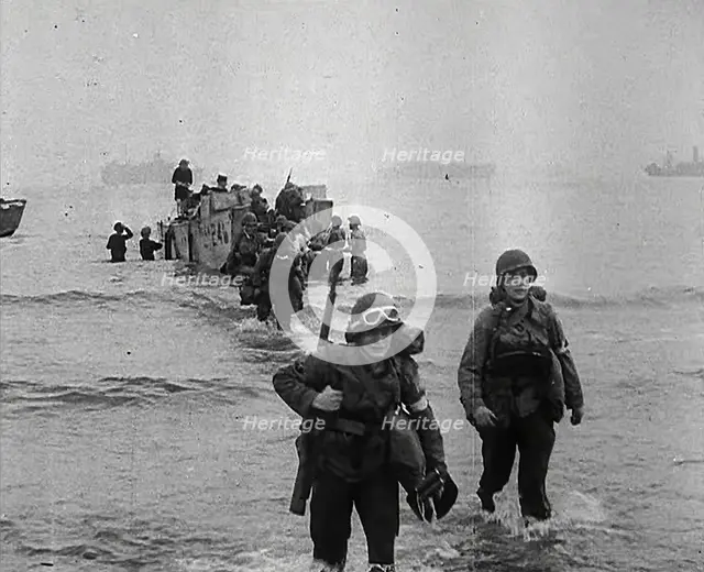 American Troops Walking Onto a North African Beach as Part of 'Operation Torch', 1942. Creator: British Pathe Ltd.
