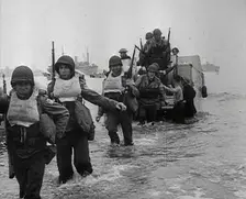 American Troops Walking Onto a North African Beach as Part of Operation Torch 1942. Creator: British Pathe Ltd