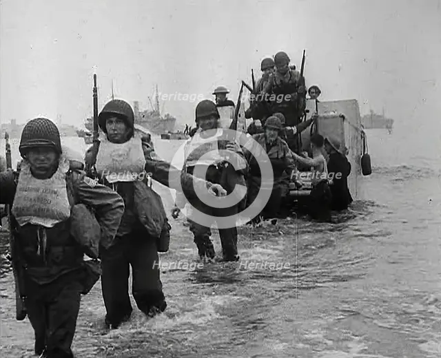 American Troops Walking Onto a North African Beach as Part of 'Operation Torch’, 1942. Creator: British Pathe Ltd.