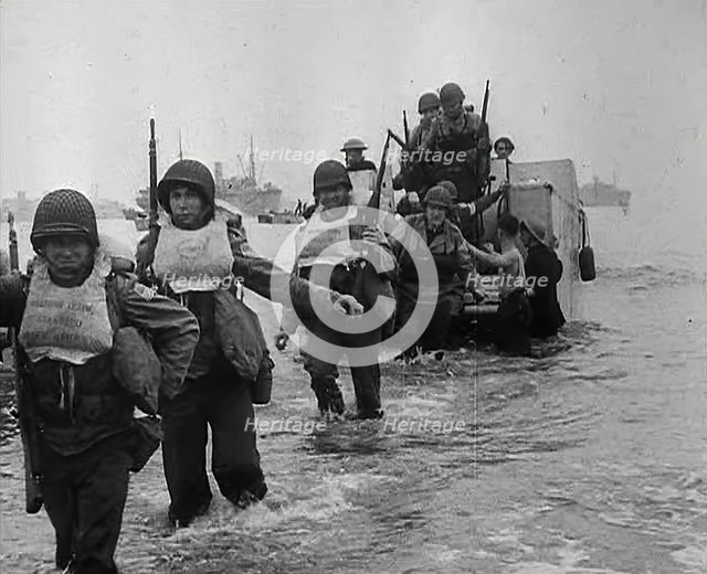 American Troops Walking Onto a North African Beach as Part of 'Operation Torch’, 1942. Creator: British Pathe Ltd.