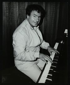 American trombonist and teacher Phil Wilson playing the piano, London, 1985. Creator: Denis Williams