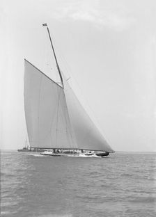America's Cup challenger Shamrock IV sailing without topsail, 1914. Creator: Kirk & Sons of Cowes