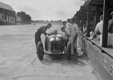 Amilcar C6 of Bill Humphreys in the pits, BRDC 500 Mile Race, Brooklands, 1931. Artist: Bill Brunell