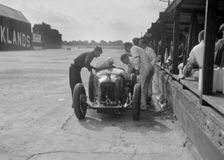 Amilcar C6 of Bill Humphreys in the pits, BRDC 500 Mile Race, Brooklands, 1931. Artist: Bill Brunell
