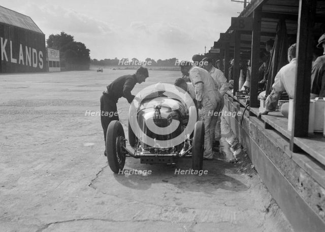 Amilcar C6 of Bill Humphreys in the pits, BRDC 500 Mile Race, Brooklands, 1931. Artist: Bill Brunell.