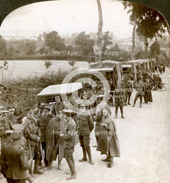Ammunition convoy parked in a Flanders lane awaiting orders, World War I, 1914-1918.Artist: Realistic Travels Publishers