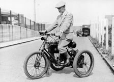 An 1898 De Dion tricycle and rider, (c1898?)