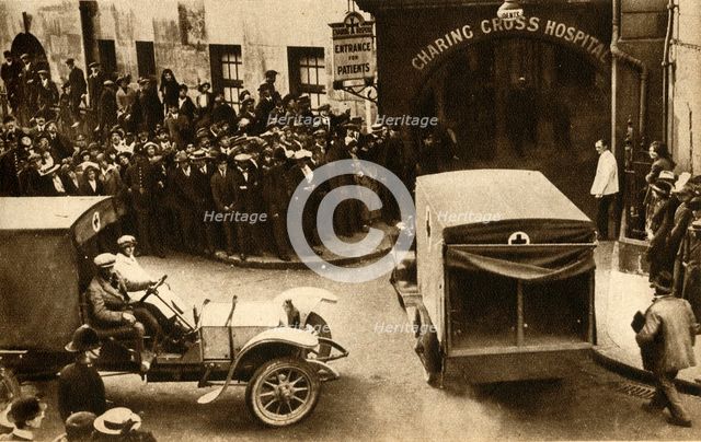 'An ambulance driving into Charing Cross Hospital with casualties...', London, 1914, (1933).  Creator: Unknown.