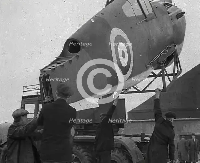 An American Aircraft Part Being Carried by a Crane to Be Sent by the USA to Britain, 1941. Creator: British Pathe Ltd.