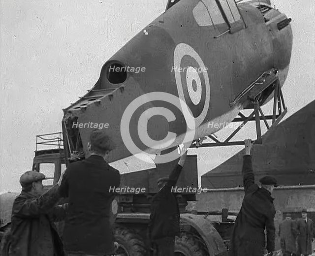 An American Aircraft Part Being Carried by a Crane to Be Sent by the USA to Britain, 1941. Creator: British Pathe Ltd.