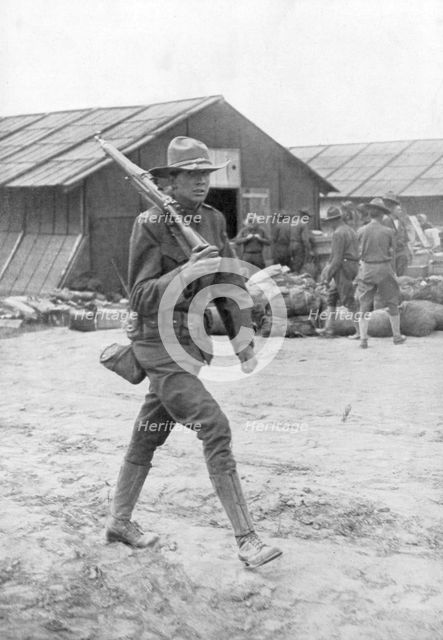 An American soldier on sentry duty, Saint Nazaire, France, c1917. Artist: Unknown