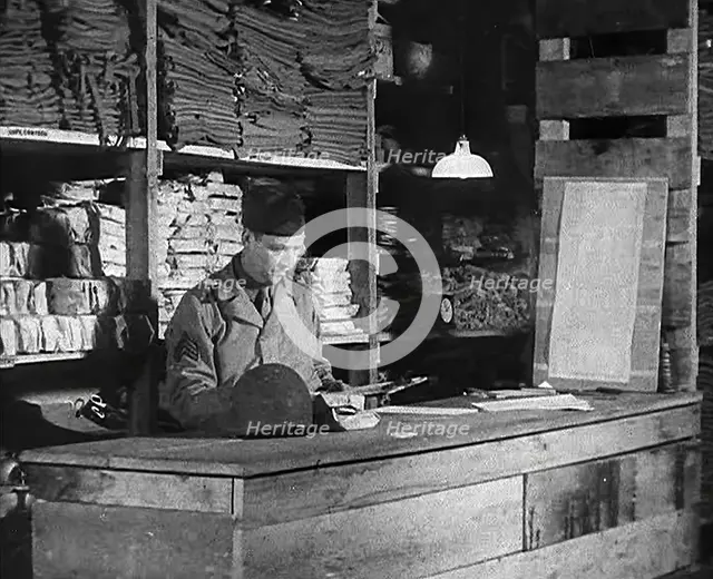 An American Store Keeper Logging Stocks of Supplies at a Storage Facility in an..., 1943-1944. Creator: British Pathe Ltd.
