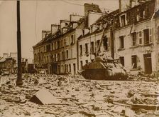 An American tank stands in a road in Cherbourg, Normandy, 1944