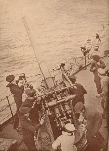 An anti-aircraft gun in action on a British battleship, c1917 (1919)
