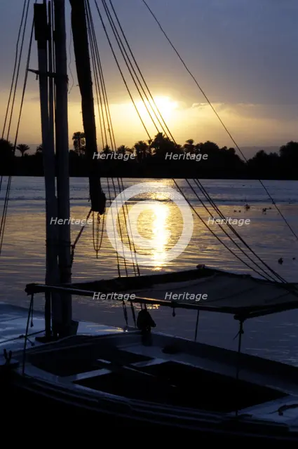 An anchored felucca on the River Nile at sunset. Artist: Unknown