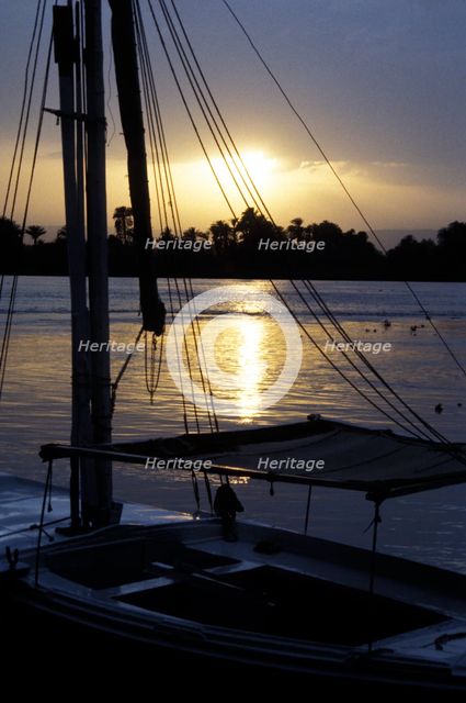 An anchored felucca on the River Nile at sunset. Artist: Unknown