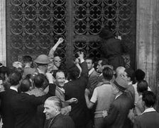 An Angry Mob Attacking a Fascist Building, 1944. Creator: British Pathe Ltd