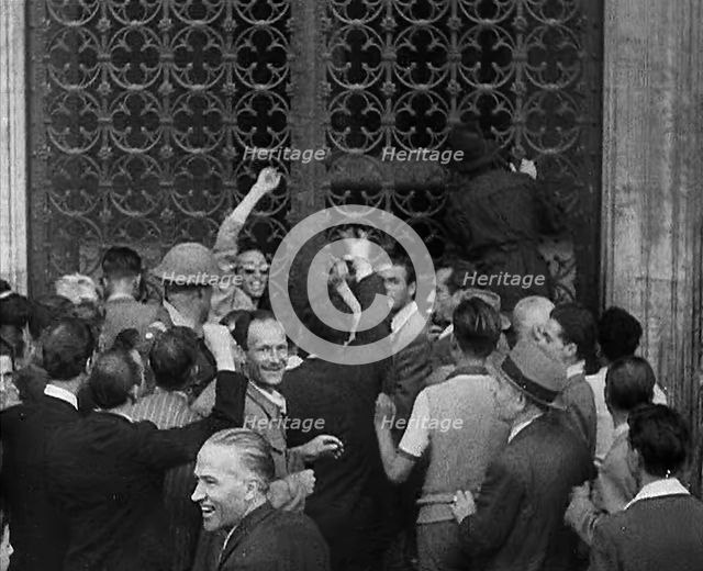 An Angry Mob Attacking a Fascist Building, 1944. Creator: British Pathe Ltd.