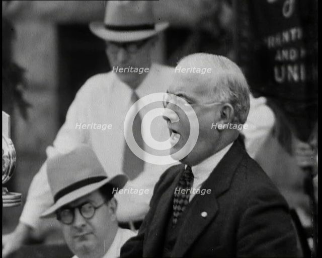 An Angry Politician Speaking from a Stage Proposing Drastic Measures in Fight Against Comm..., 1932. Creator: British Pathe Ltd.
