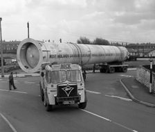 An absorption tower being transported by road, Dukenfield, Manchester, 1962. Creator: Michael Walters