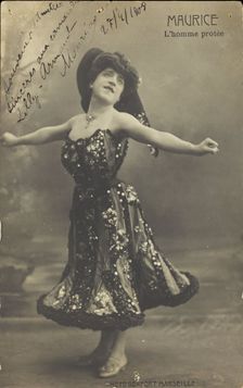 An actor in drag, known as "Maurice"; poses on stage mid-dance, 1908. Creator: Unknown