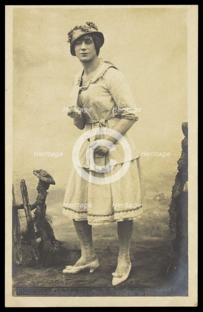 An actor, in drag, performing English theatre at a prisoner of war camp in Cottbus, [1910-1919?]. Creator: Unknown.