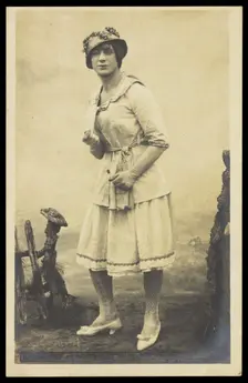 An actor, in drag, performing English theatre at a prisoner of war camp in Cottbus, [1910-1919?]. Creator: Unknown