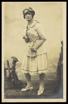 An actor, in drag, performing English theatre at a prisoner of war camp in Cottbus, [1910-1919?]. Creator: Unknown