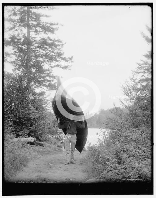 An Adirondack carry, c1902. Creator: William H. Jackson.