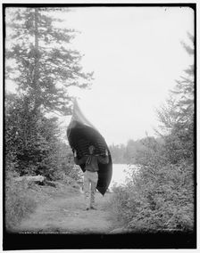 An Adirondack carry, c1902. Creator: William H. Jackson