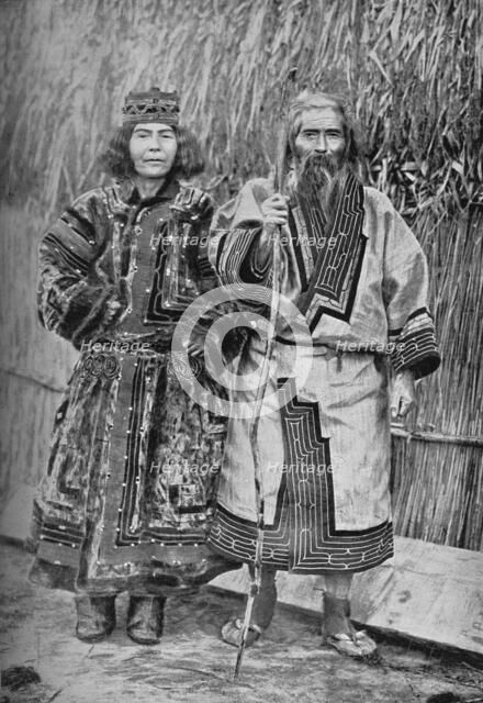 An Ainu and his wife, Japan, 1902. Artist: Kajima & Suwo.