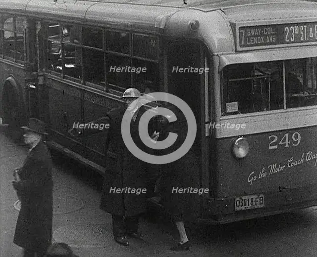 An Air Raid Warden Directing Civilians, 1942. Creator: British Pathe Ltd.