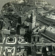 An Air View of Downtown Cleveland - Public Square, Terminal Tower and the Winding Cuyahoga 1930s. Creator: Unknown