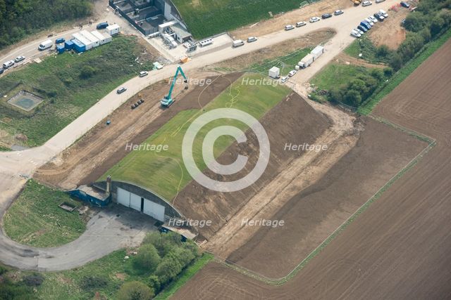 An aircraft hangar being returfed, Hullavington Airfield, Wiltshire, 2019. Creator: Damian Grady.