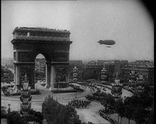 An Airship in the Skies Above Paris Near the Arc de Triomphe During the Royal State Visit..., 1938. Creator: British Pathe Ltd