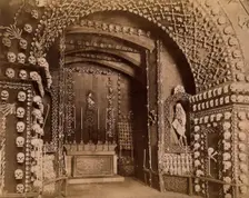 An altar bearing a Latin inscription surrounded by an array of human skulls and bones and..., 1881. Creator: John Edmund Taylor