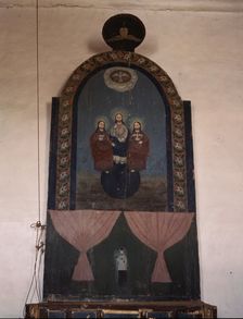 An altar in the church dedicated to the Trinity, Trampas, N.M., 1943. Creator: John Collier