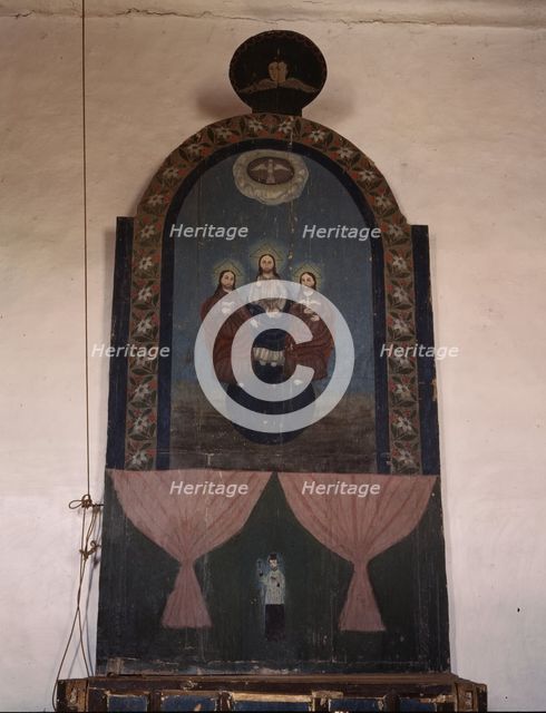 An altar in the church dedicated to the Trinity, Trampas, N.M., 1943. Creator: John Collier.
