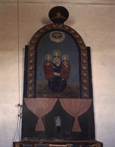An altar in the church dedicated to the Trinity, Trampas, N.M., 1943. Creator: John Collier