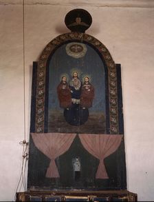 An altar in the church dedicated to the Trinity, Trampas, N.M., 1943. Creator: John Collier