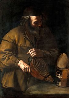 An alchemist applying bellows to a fire beneath a retort, 18th (?) century. Creator: Unknown