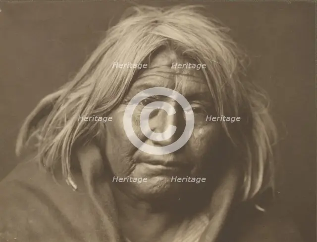 An Apache, 1903. Creator: Edward Sheriff Curtis.