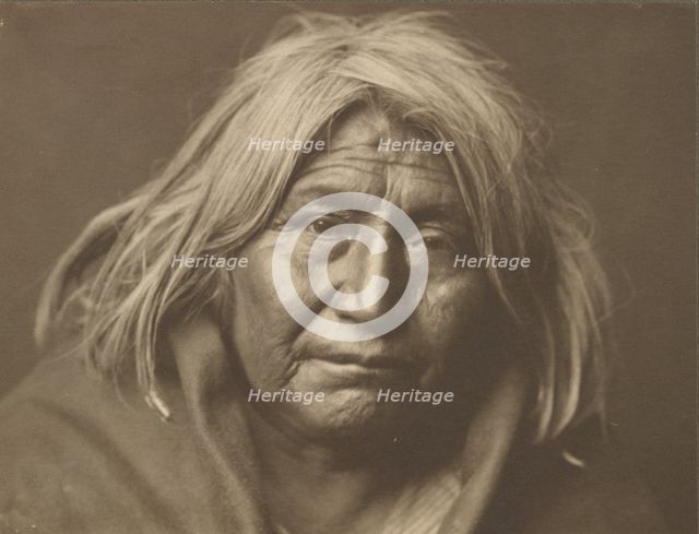 An Apache, 1903. Creator: Edward Sheriff Curtis.