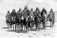 An Araucanian (Mapuche) chief and his staff, Chile/Argentina, 1895